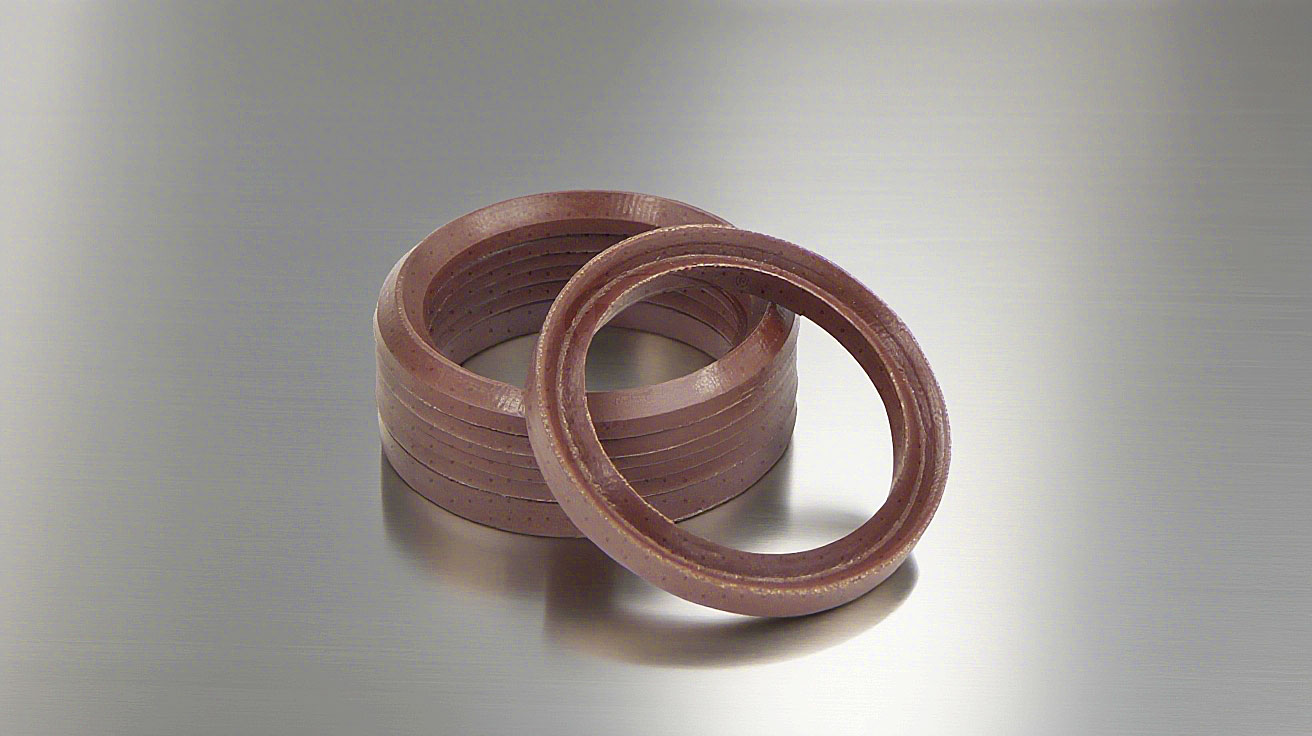 氟橡膠V型夾布油封---是由氟橡膠（FKM）+夾布密封材料制成的油封，主要應(yīng)用于盾構(gòu)機、冶金設(shè)備、陶瓷設(shè)備、重載油缸、油壓機等